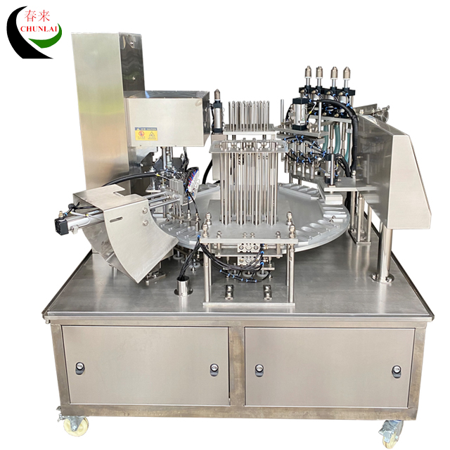 KIS-900 4 Spoons Per Time Rotary Type Honey Spoon Filling Sealing Machine